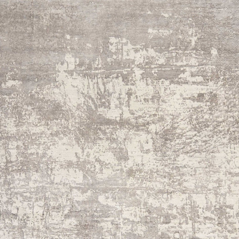 5' X 7' Beige And Ivory Abstract Hand Loomed Area Rug