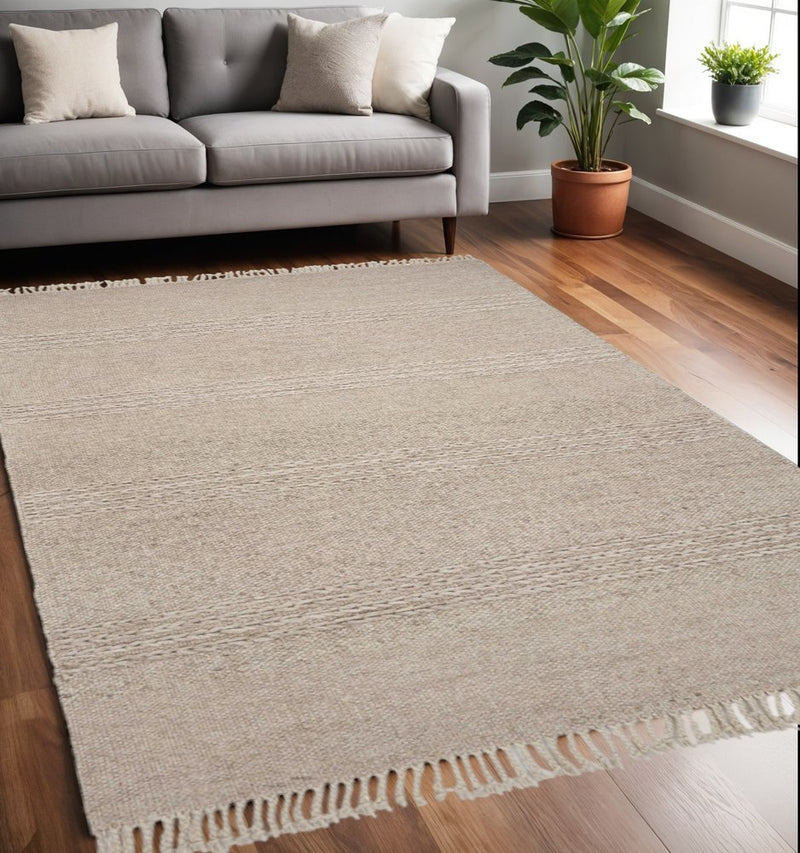 7' X 9' Beige Wool Hand Woven Area Rug