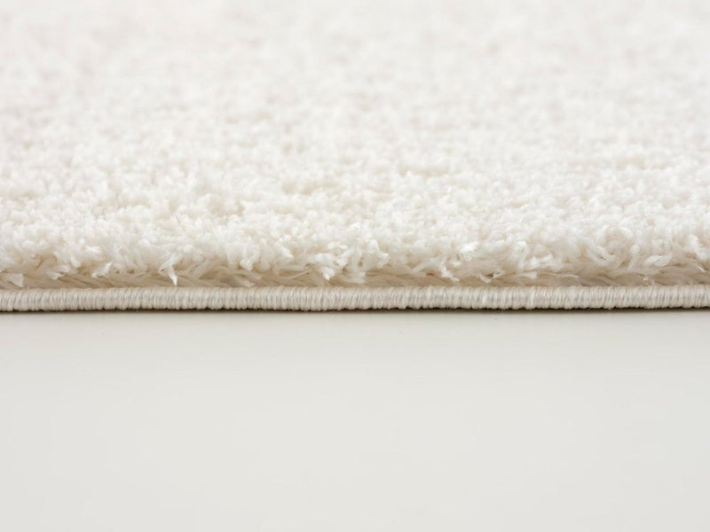 7' X 9' Ivory Modern Solid Shag Area Rug