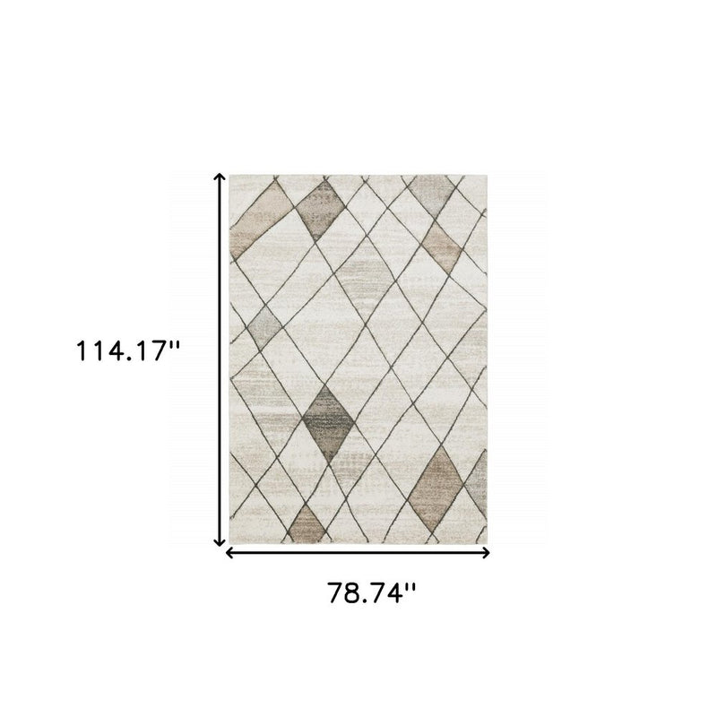 3' X 5' Beige Grey Tan And Brown Geometric Power Loom Stain Resistant Area Rug