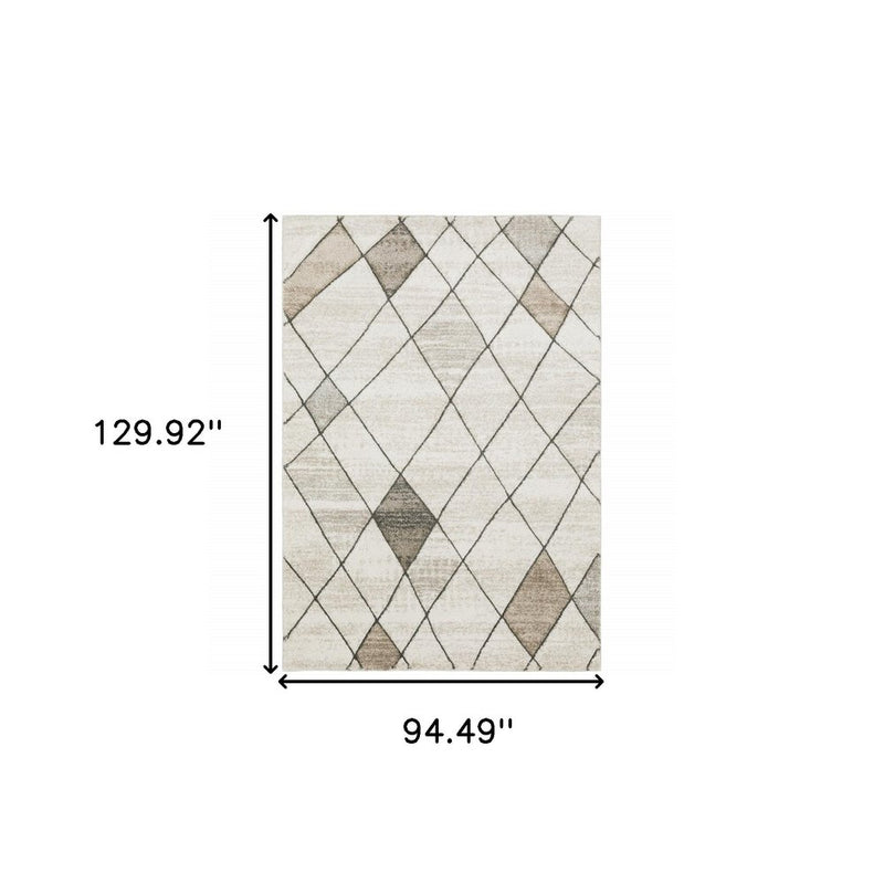 3' X 5' Beige Grey Tan And Brown Geometric Power Loom Stain Resistant Area Rug