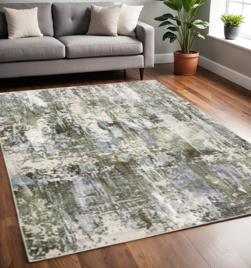 3' X 5' Green Blue Grey Ivory And Brown Abstract Power Loom Stain Resistant Area Rug