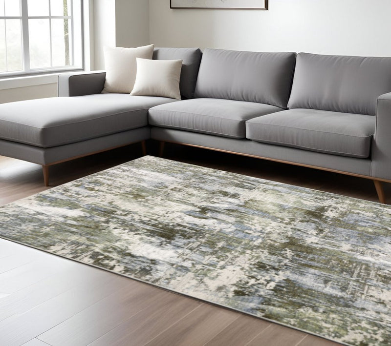 3' X 5' Green Blue Grey Ivory And Brown Abstract Power Loom Stain Resistant Area Rug