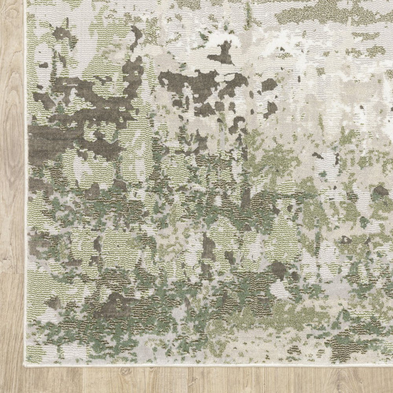 8' X 11' Beige Grey Brown And Sage Green Abstract Power Loom Stain Resistant Area Rug