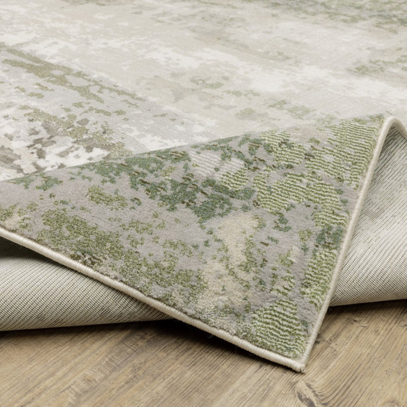 8' X 11' Beige Grey Brown And Sage Green Abstract Power Loom Stain Resistant Area Rug