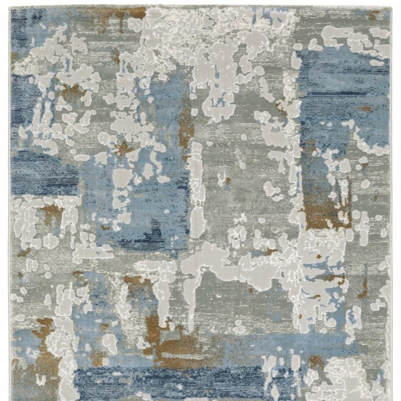 2' X 8' Grey Blue Navy Ivory And Brown Abstract Power Loom Stain Resistant Runner Rug