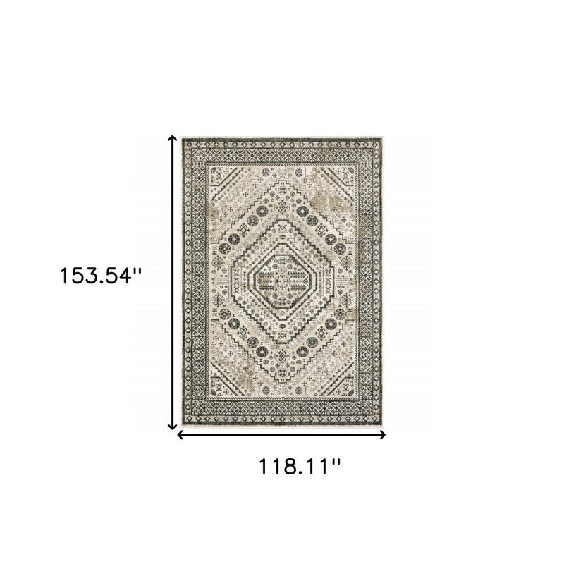 4' X 6' Ivory Grey Black And Ivory Oriental Power Loom Stain Resistant Area Rug