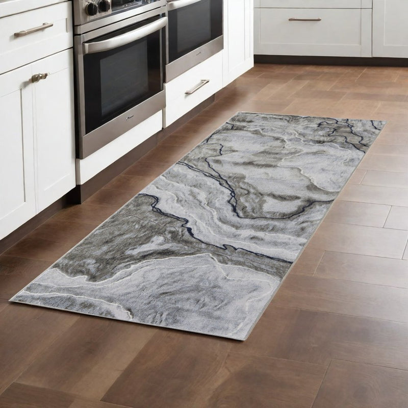 5' X 7' Ivory Blue and Gray Abstract Power Loom Area Rug