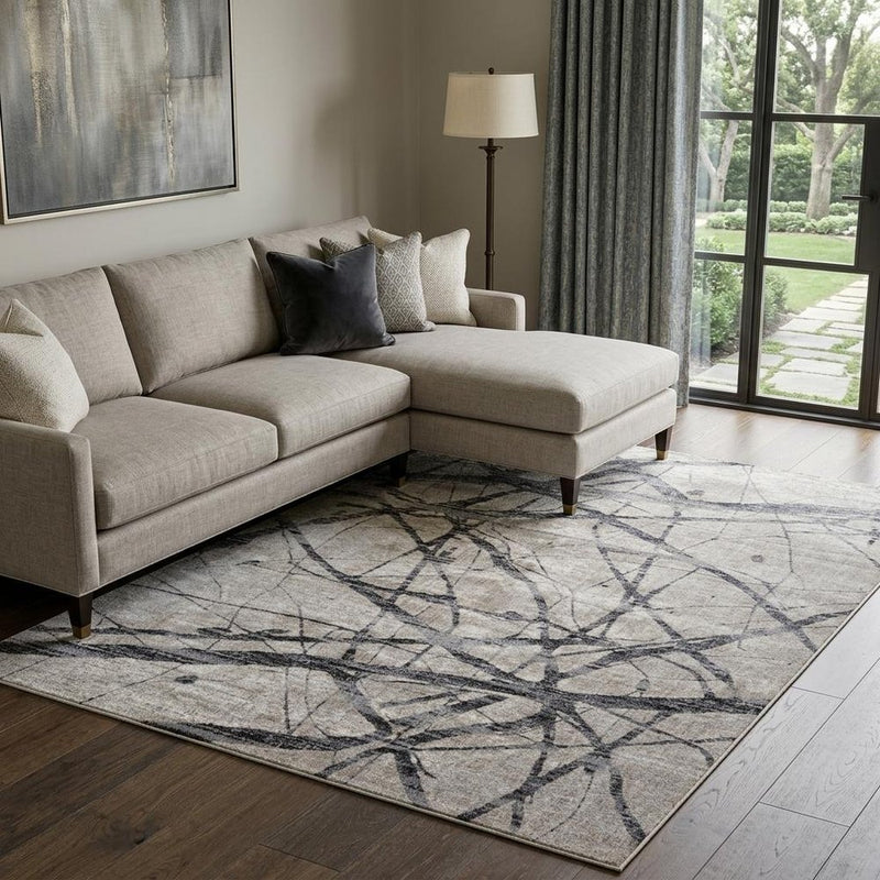 4' X 6' Taupe Gray And Ivory Abstract Stain Resistant Area Rug