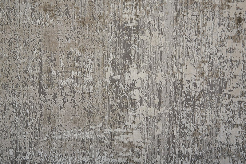 3' X 5' Tan and Ivory Abstract Power Loom Distressed Area Rug With Fringe