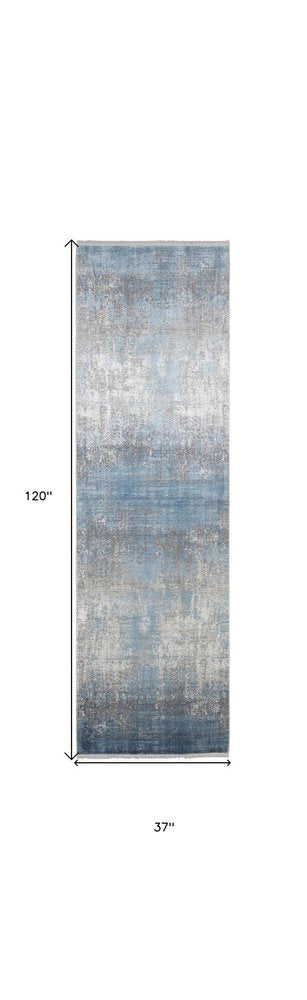 3' X 5' Blue and Gray Abstract Power Loom Distressed Area Rug With Fringe