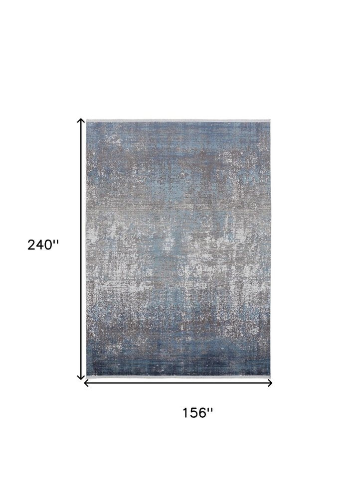 3' X 5' Blue and Gray Abstract Power Loom Distressed Area Rug With Fringe