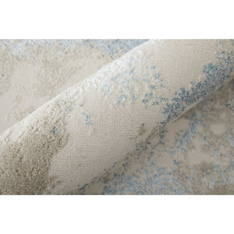 5' X 8' Ivory Blue And Gray Abstract Area Rug