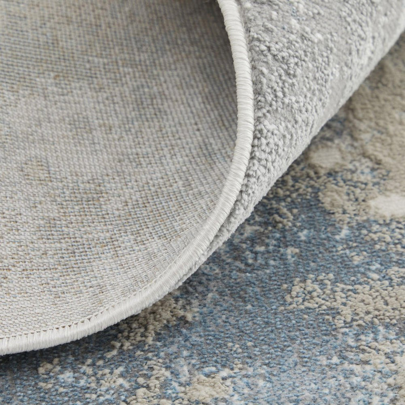 5' X 8' Ivory Blue And Gray Abstract Area Rug