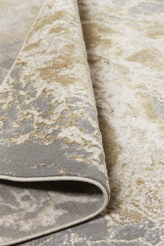 5' X 8' Ivory Tan And Gray Abstract Area Rug