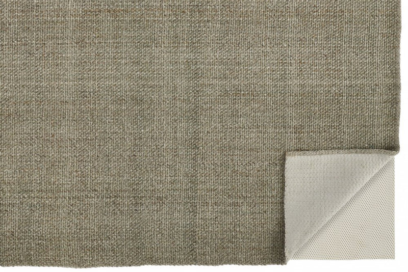 5' X 8' Tan And Green Hand Woven Area Rug