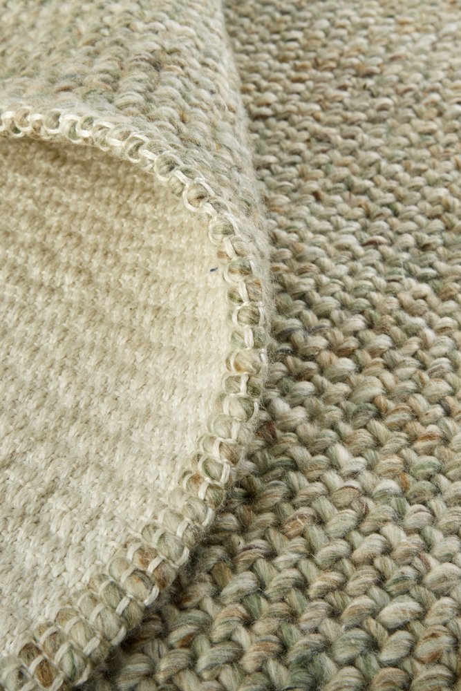 5' X 8' Tan And Green Hand Woven Area Rug