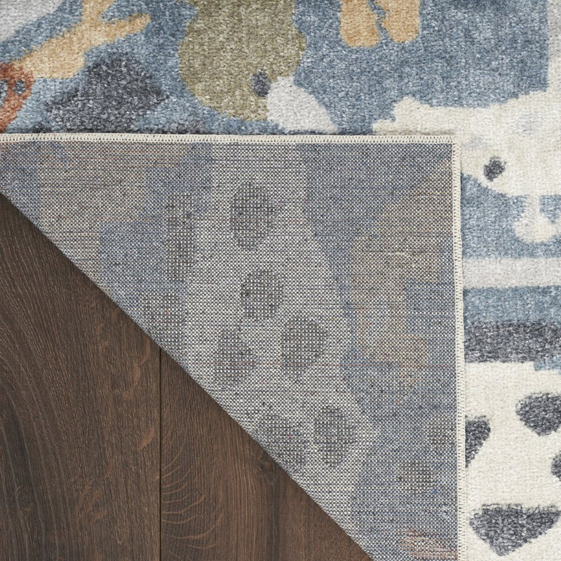 7' X 9' Ivory Blue and Gray Animal Print Power Loom Washable Area Rug