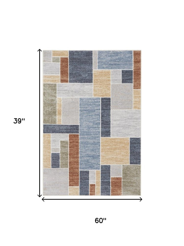3' X 5' Blue Brown And Tan Geometric Washable Area Rug