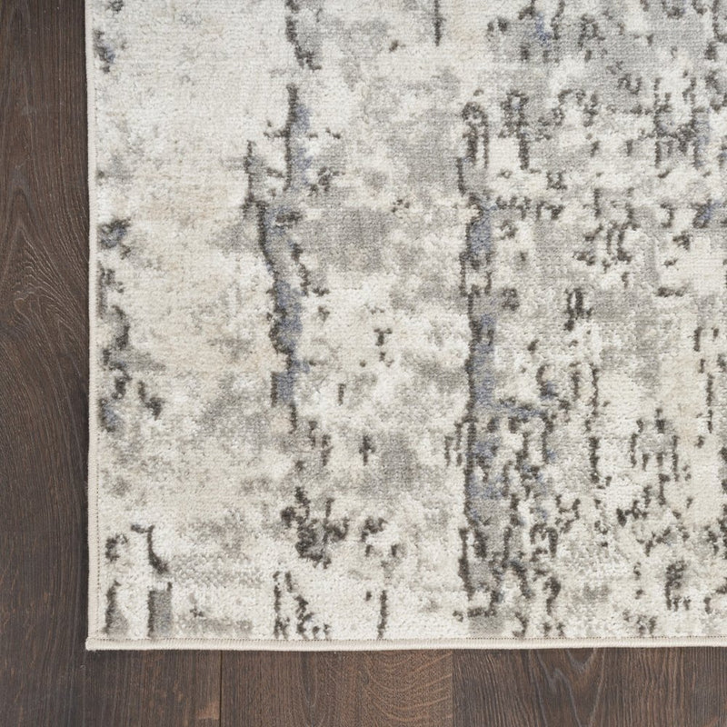 5' X 7' Gray And Ivory Abstract Area Rug