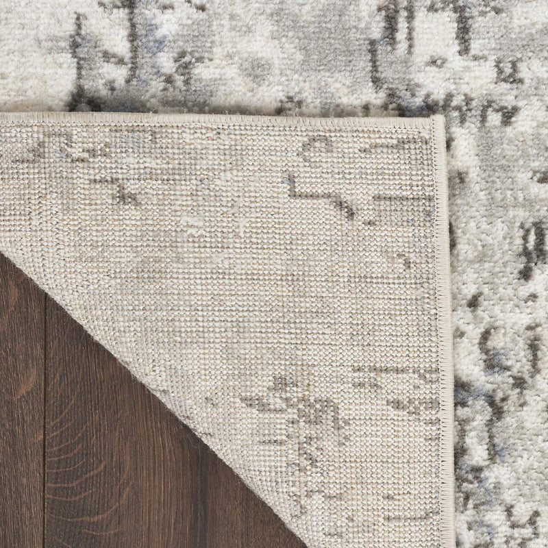 5' X 7' Gray And Ivory Abstract Area Rug