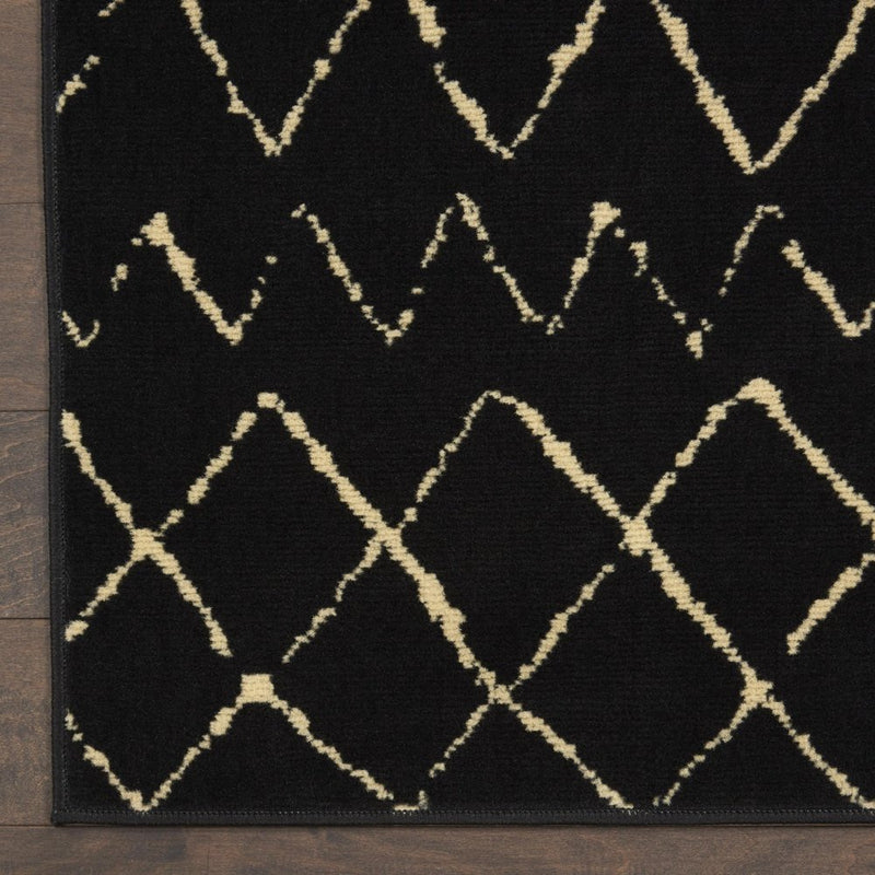 8' X 10' Black and Ivory Abstract Power Loom Distressed Area Rug