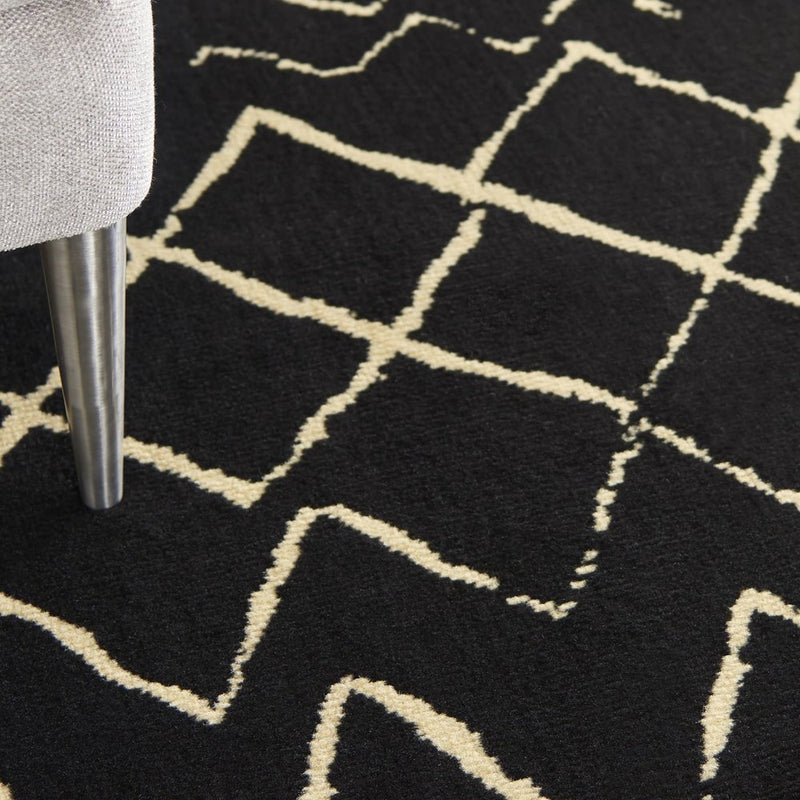 8' X 10' Black and Ivory Abstract Power Loom Distressed Area Rug