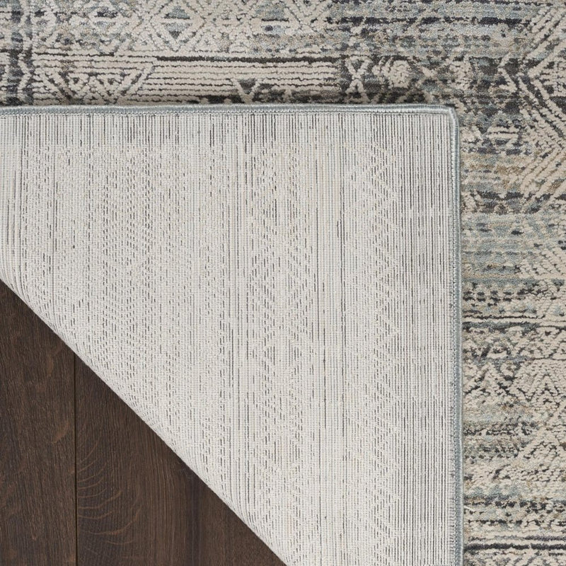 10' Ivory And Blue Geometric Distressed Runner Rug With Fringe
