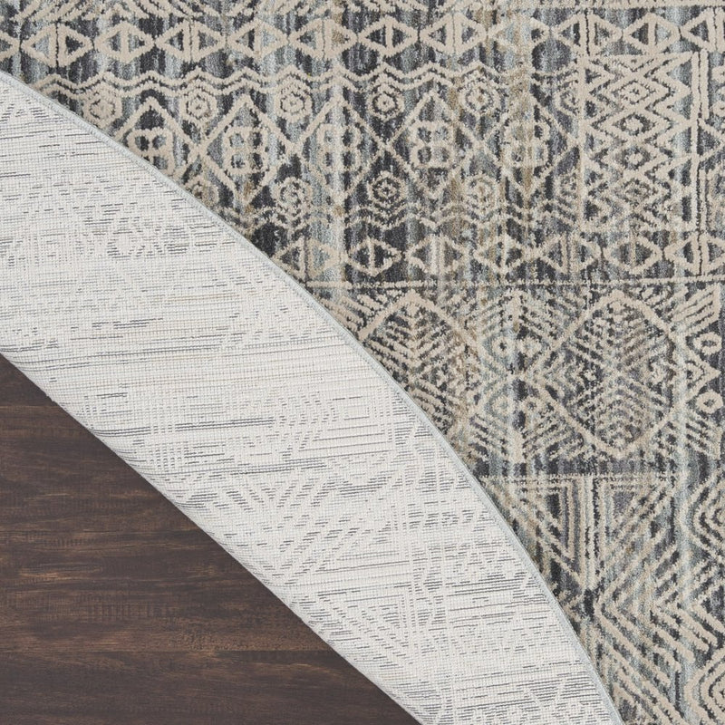 8' Ivory And Blue Geometric Distressed Round Rug With Fringe