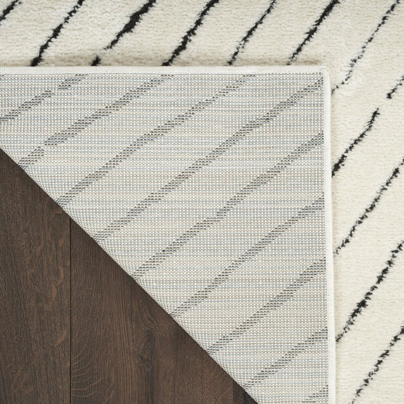 8' X 10' Ivory And Black Abstract Area Rug