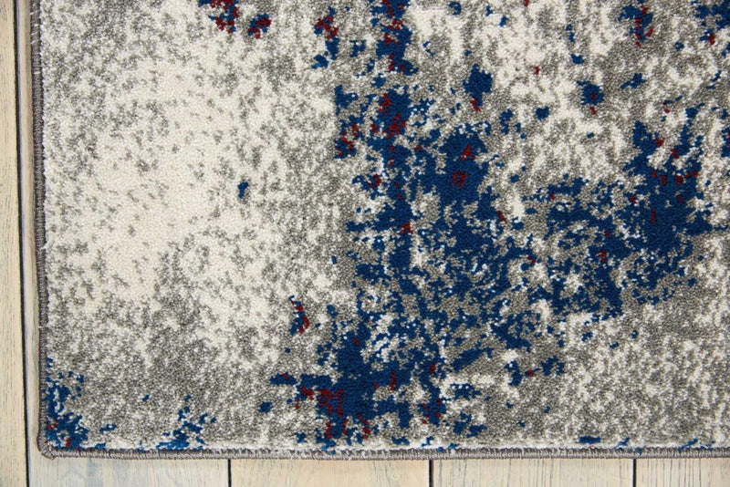 8' X 11' Ivory Red and Blue Abstract Non Skid Area Rug