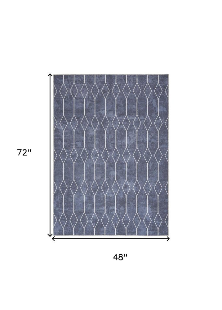 4' X 6' Blue And Ivory Geometric Area Rug