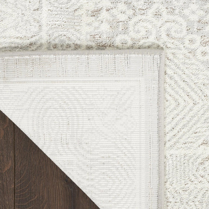 5' X 7' Ivory And Silver Floral Distressed Non Skid Area Rug