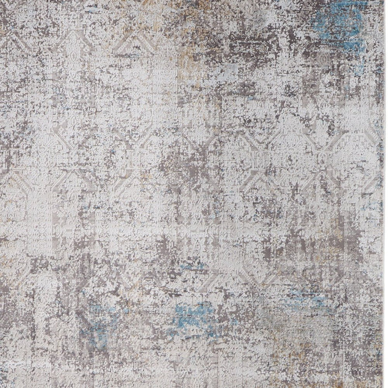 3' X 5' Ivory Gray and Blue Abstract Power Loom Area Rug With Fringe