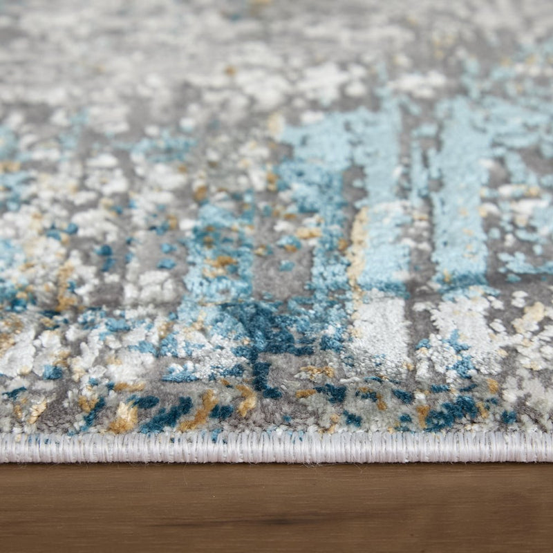 3' X 5' Ivory Gray and Blue Abstract Power Loom Area Rug With Fringe