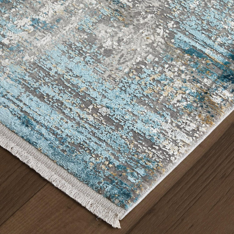 3' X 5' Ivory Gray and Blue Abstract Power Loom Area Rug With Fringe