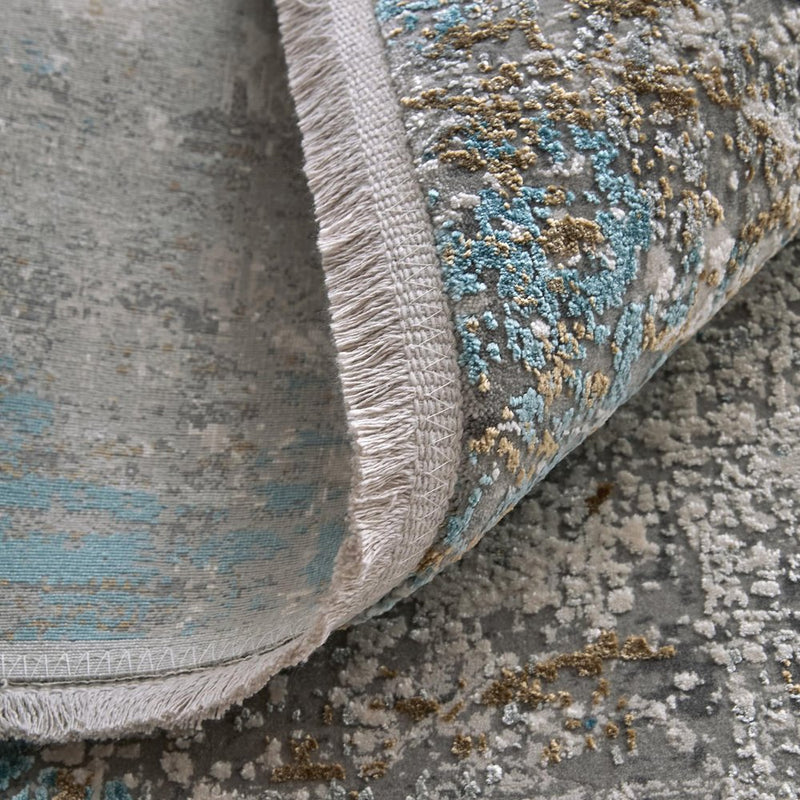 3' X 5' Ivory Gray and Blue Abstract Power Loom Area Rug With Fringe