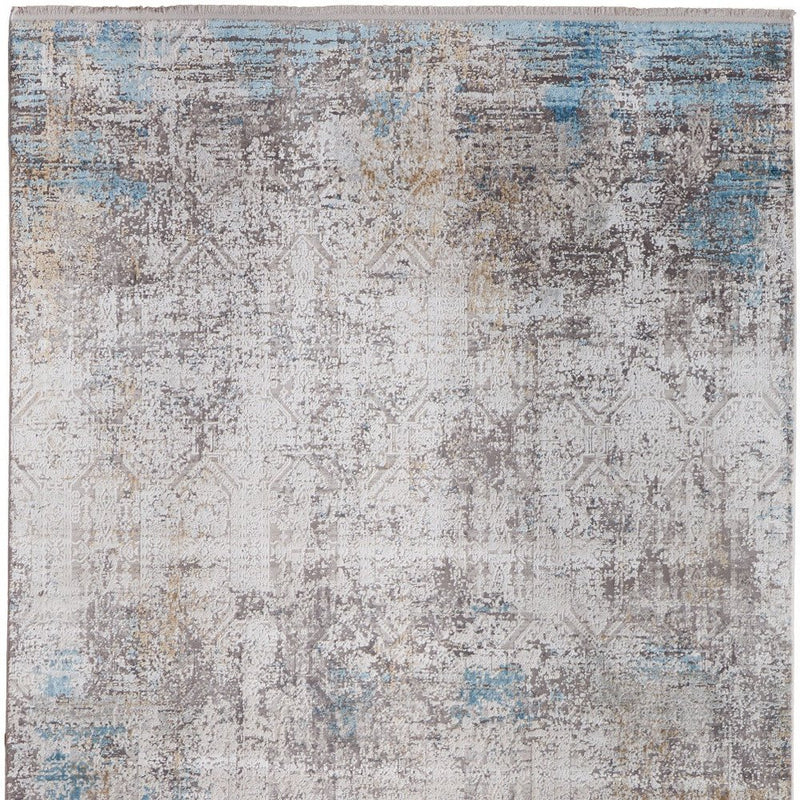 3' X 5' Ivory Gray and Blue Abstract Power Loom Area Rug With Fringe
