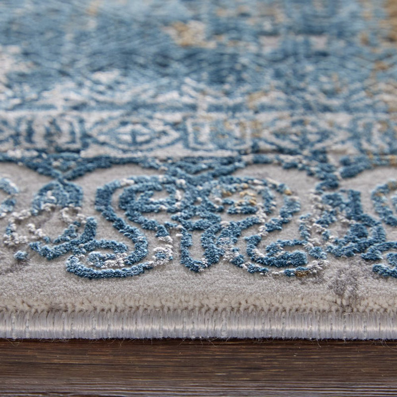 3' X 5' Blue Gold and Gray Abstract Power Loom Area Rug With Fringe