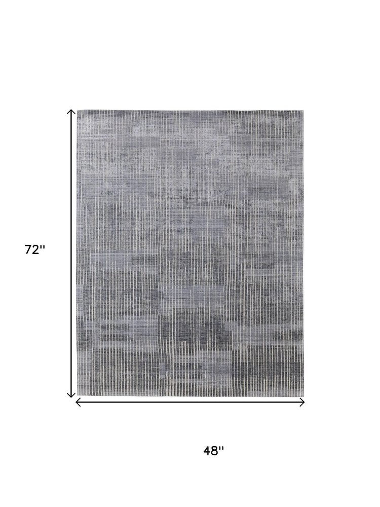 3' X 5' Blue Ivory And Gray Abstract Hand Woven Distressed Area Rug