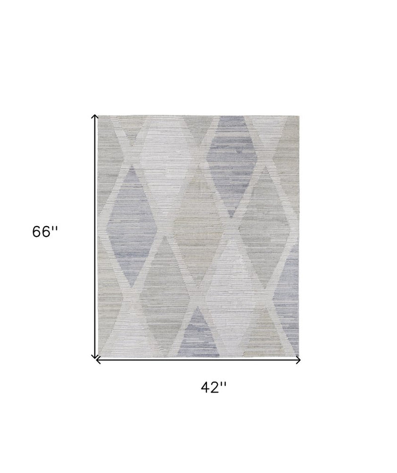 4' X 6' Ivory and Blue Geometric Hand Woven Area Rug