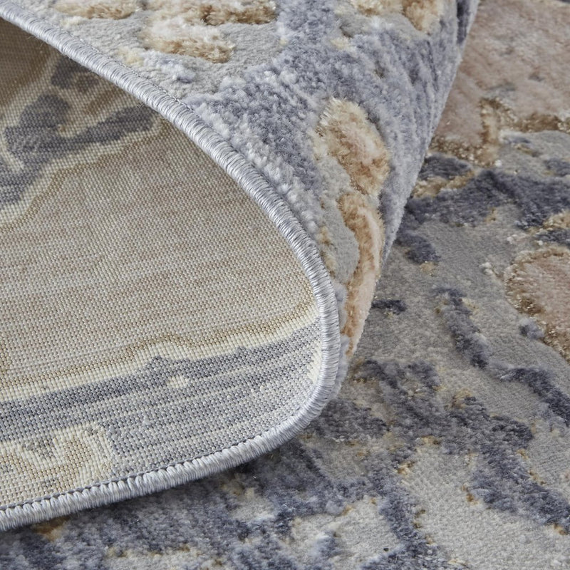 3' X 5' Tan Blue And Beige Abstract Distressed Area Rug