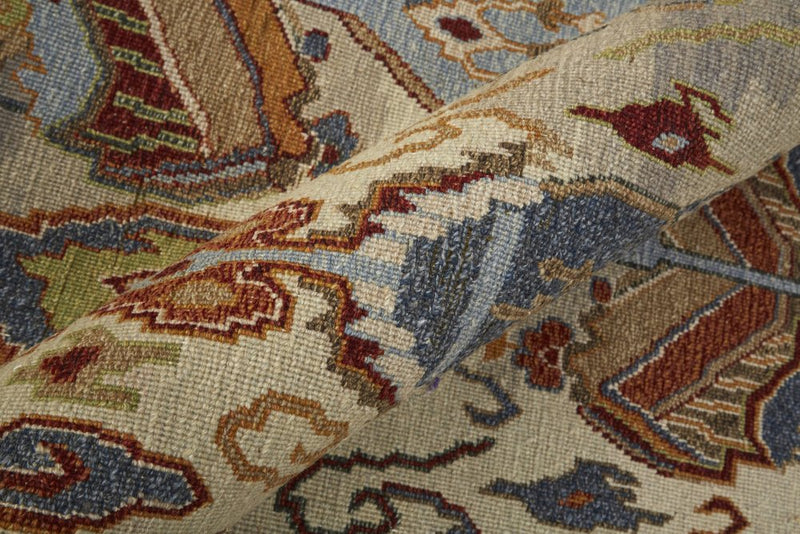 4' X 6' Ivory Blue and Brown Wool Ikat Hand Knotted Area Rug With Fringe