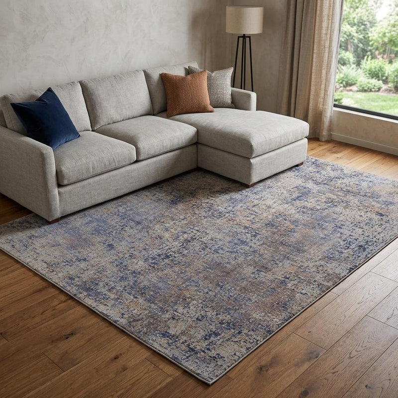 5' X 8' Blue Brown and Tan Abstract Power Loom Area Rug