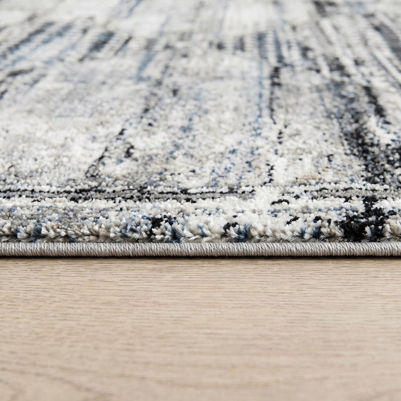 5' X 8' Gray Blue and Ivory Abstract Area Rug
