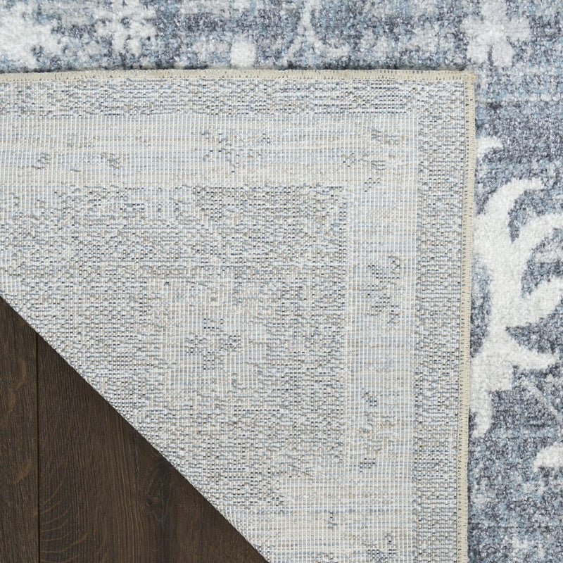 4' X 6' Blue Floral Power Loom Worn Faded Area Rug