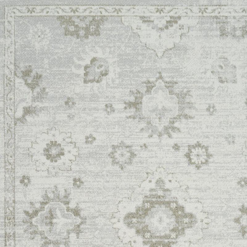 7' X 9' Ivory Floral Distressed Area Rug