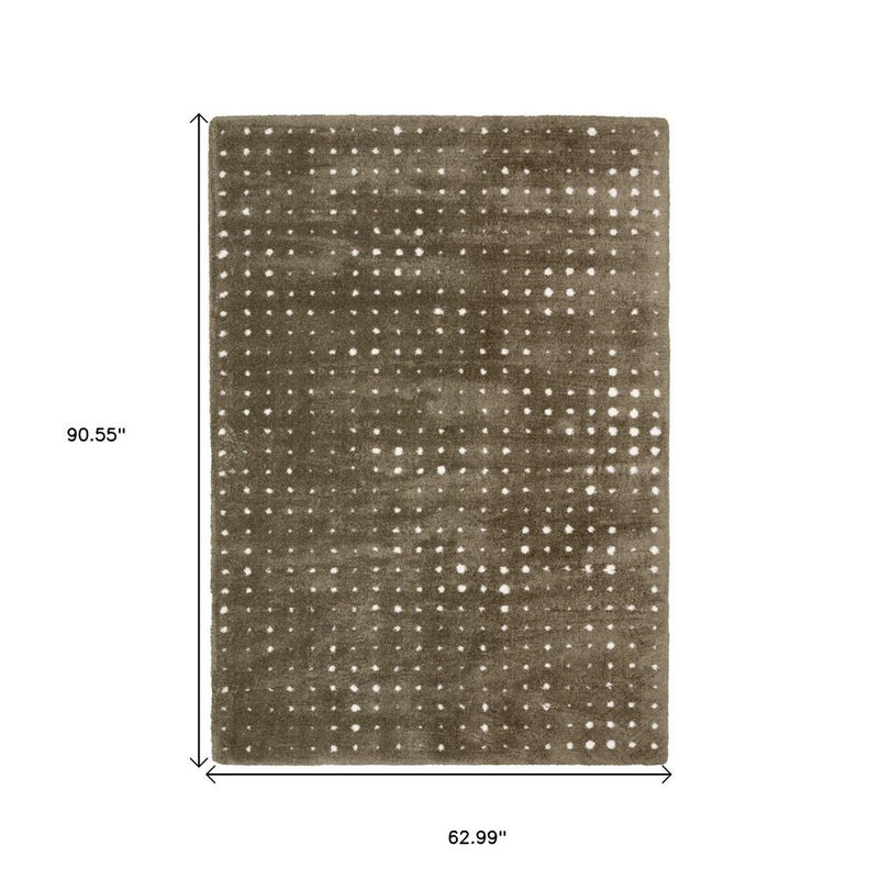 5' X 8' Brown And Ivory Geometric Area Rug