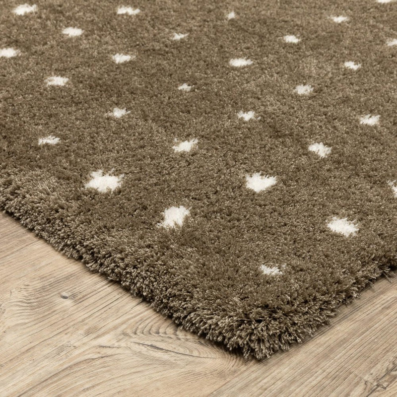 5' X 8' Brown And Ivory Geometric Area Rug