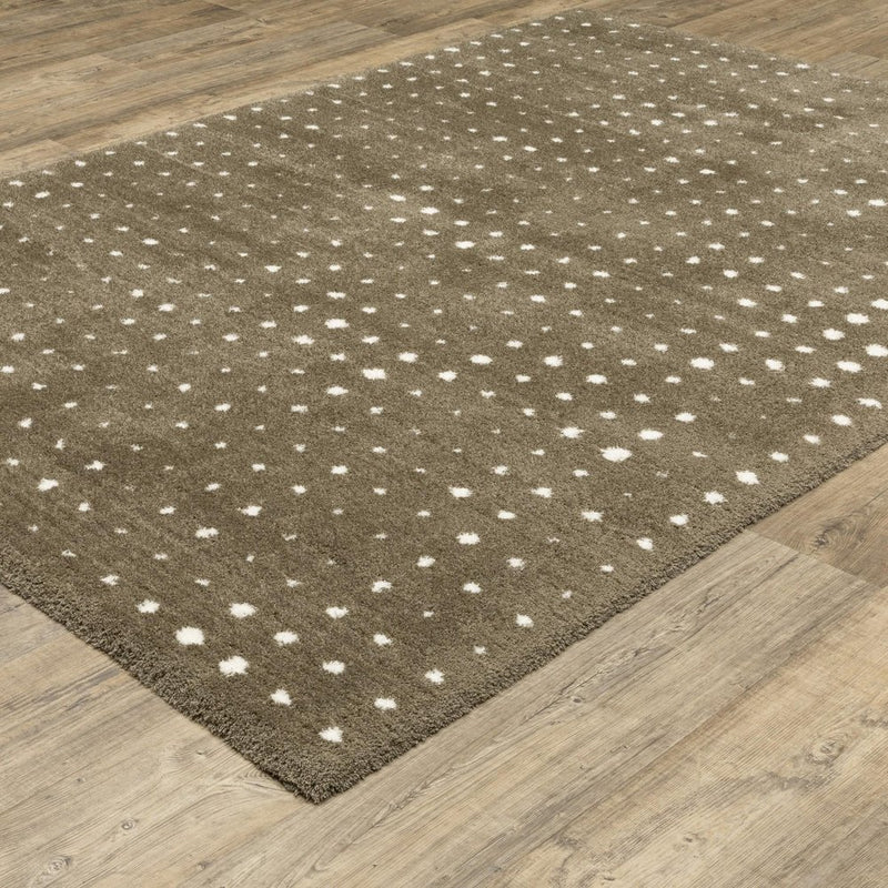 5' X 8' Brown And Ivory Geometric Area Rug